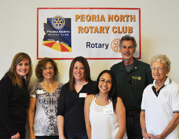 The Rotary group at the Prom Closet